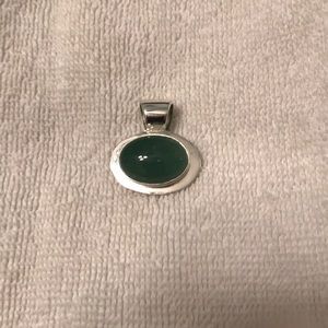 Green silver tone pendant